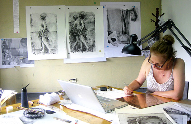 Frances burnishing the etching plate