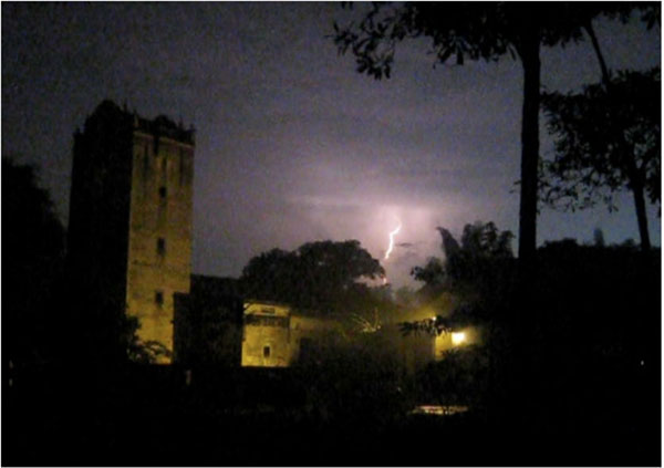 Lightning storm over village